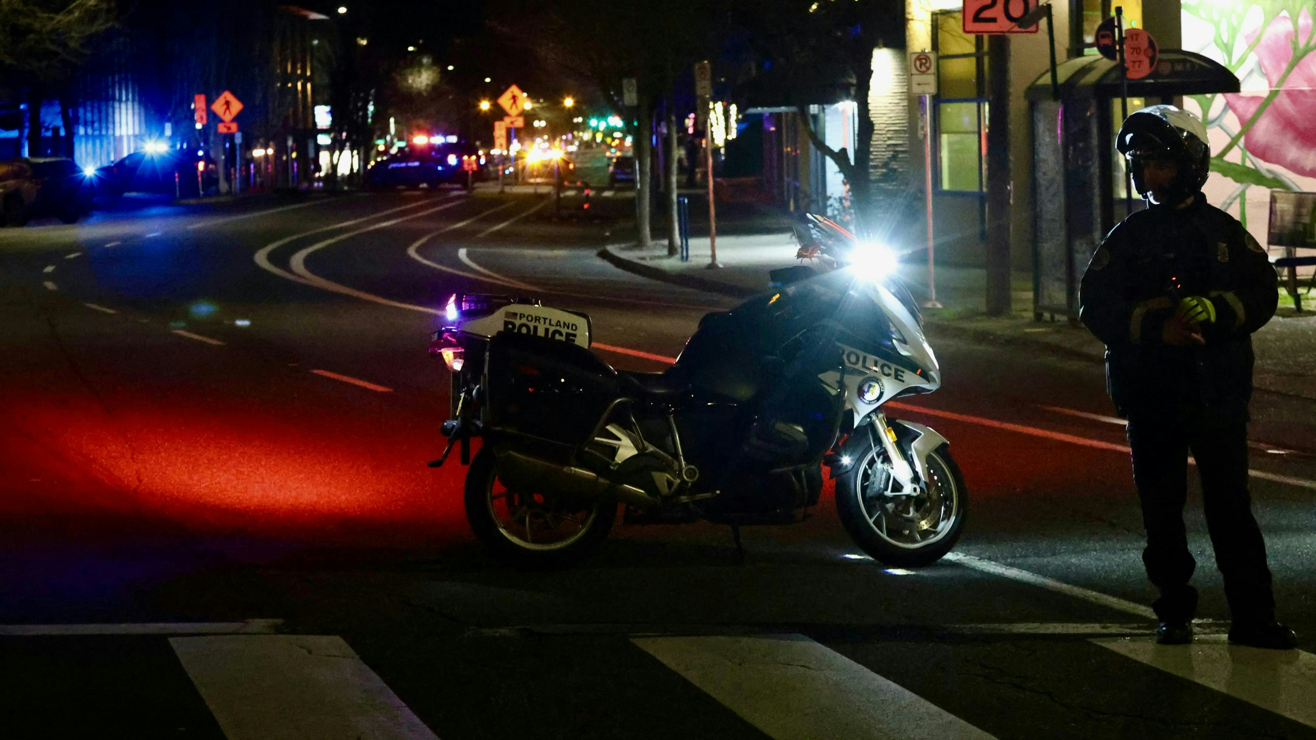 Northeast Broadway at 24th Avenue was blocked off as Portland police searched for a suspect who shot and wounded two officers on Mon., Jan. 19, 2026.