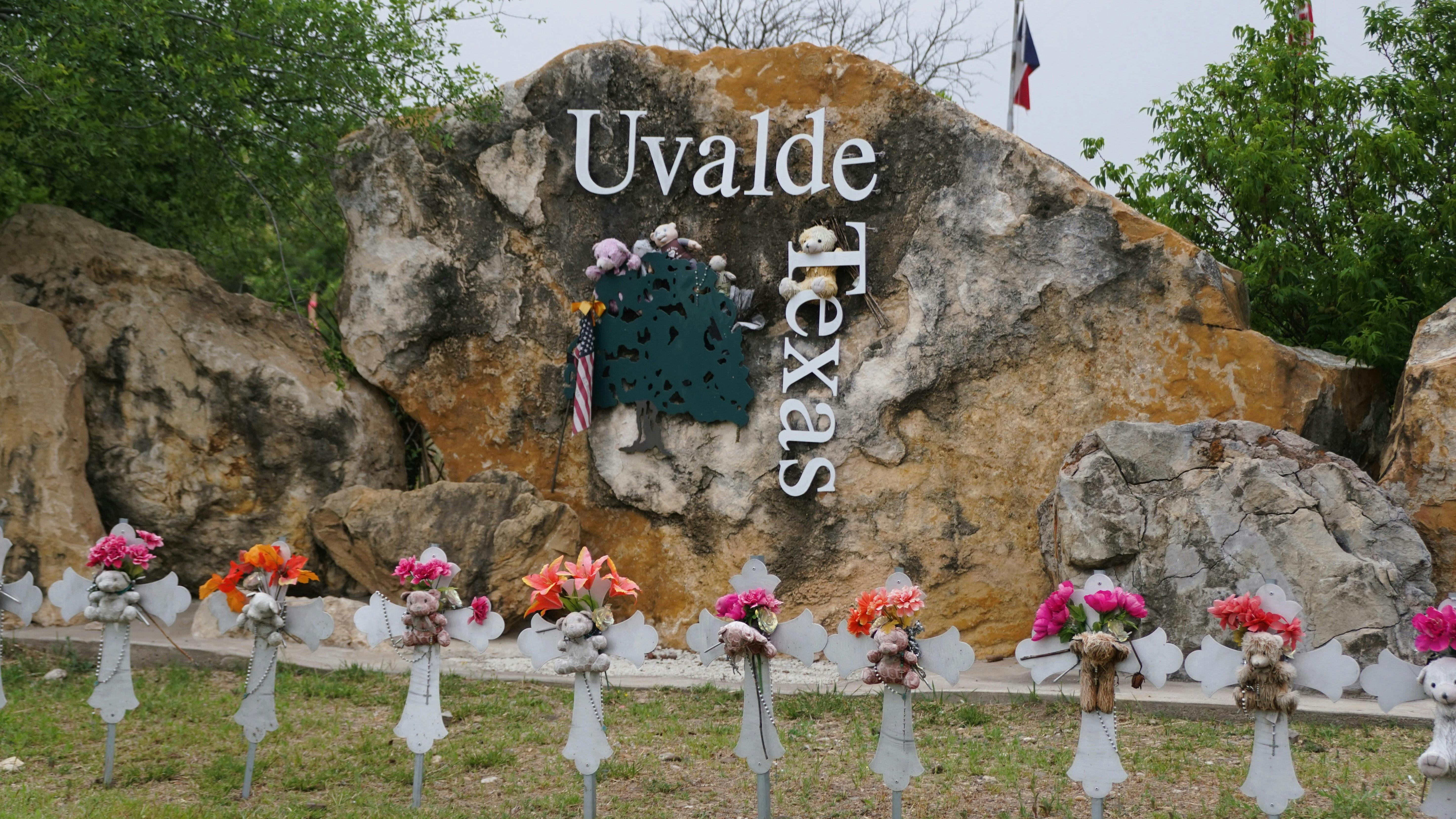 The memorial with teddy bears and flowers on the cross for the mass shooting memorials by the entrance into the town of Uvalde, Texas, on April 8, 2024.