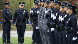 LAPD Chief Jim McDonnell, with Capt. James Hwang, left, prepares for the uniform inspection during graduation for a recruit class at the Los Angeles Police Academy on May 2, 2025, in Los Angeles. LAPD Chief Jim McDonnell, with Capt. James Hwang, left, prepares for the uniform inspection during graduation for a recruit class at the Los Angeles Police Academy on May 2, 2025, in Los Angeles.