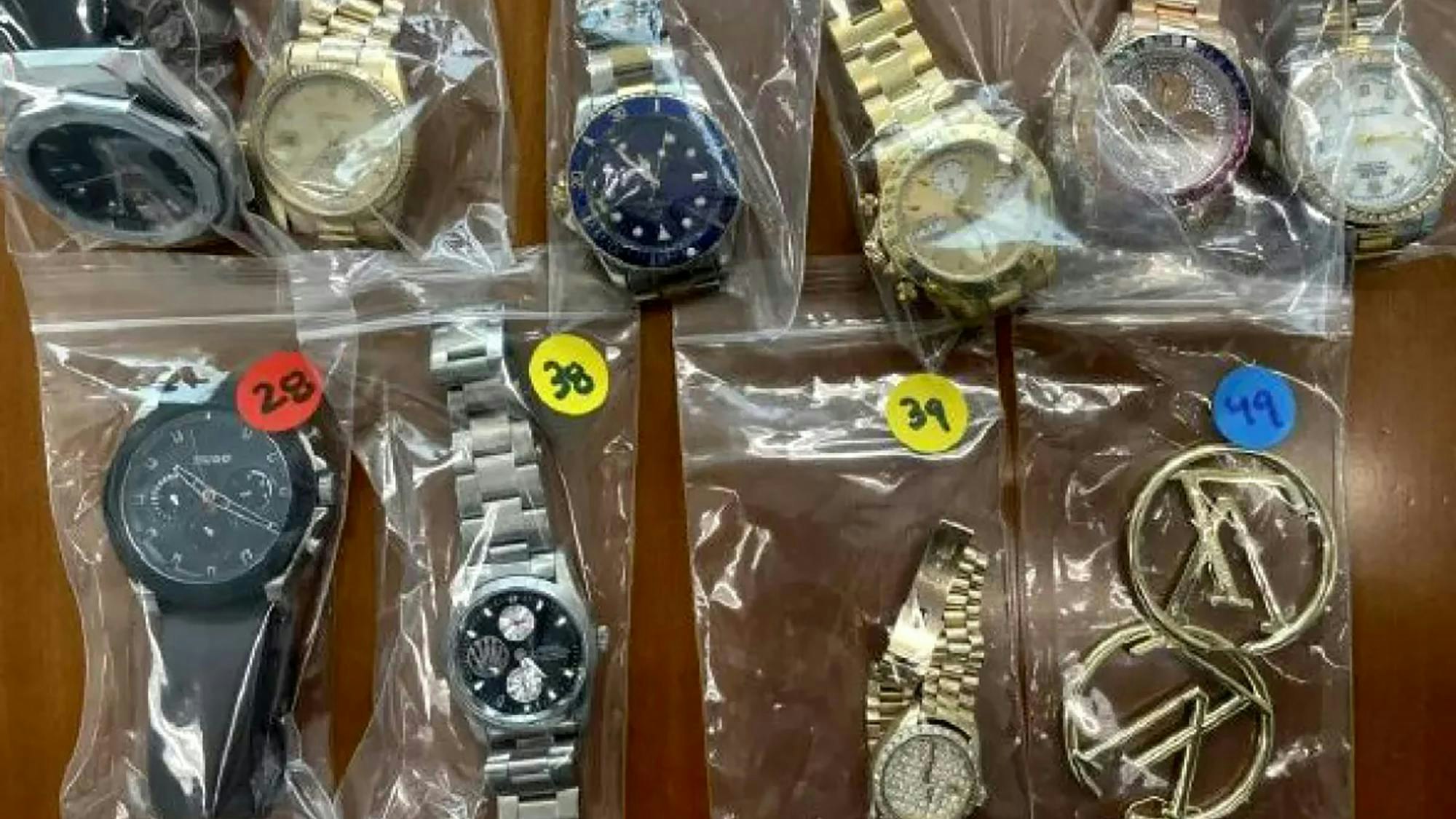 Some of the watches and other valuables recovered by the Los Angeles Police Department, which says it busted a theft ring.