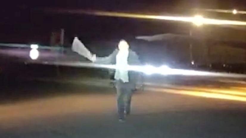 A machete-wielding man charges at a Coolidge, AZ, police officer.