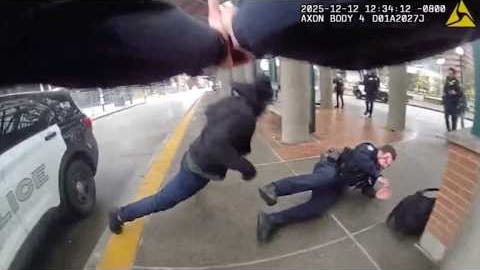 Suspect slashes a Bellevue, WA, police officer's face before stabbing him twice.