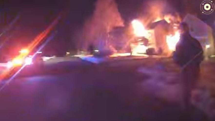 Stafford, NJ, police officers make an amazing catch during deadly house fire.