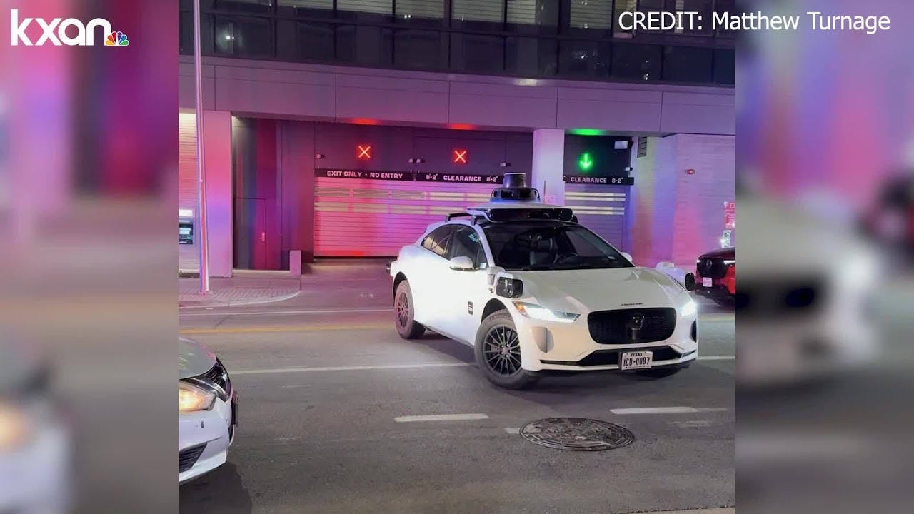 Waymo self-driving car blocks Austin, TX, emergency vehicles after shooting.