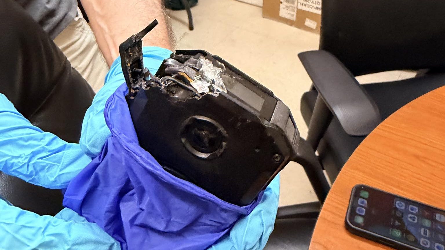 Wounded Volusia County, FL, sheriff's deputy's damaged bodycam.