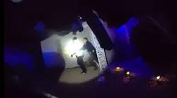 Phoenix police officer struggles with armed suspect.