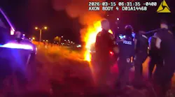 Police use shields to reach a road rage suspect in a Daytona Beach, FL, cruiser he set on fire.
