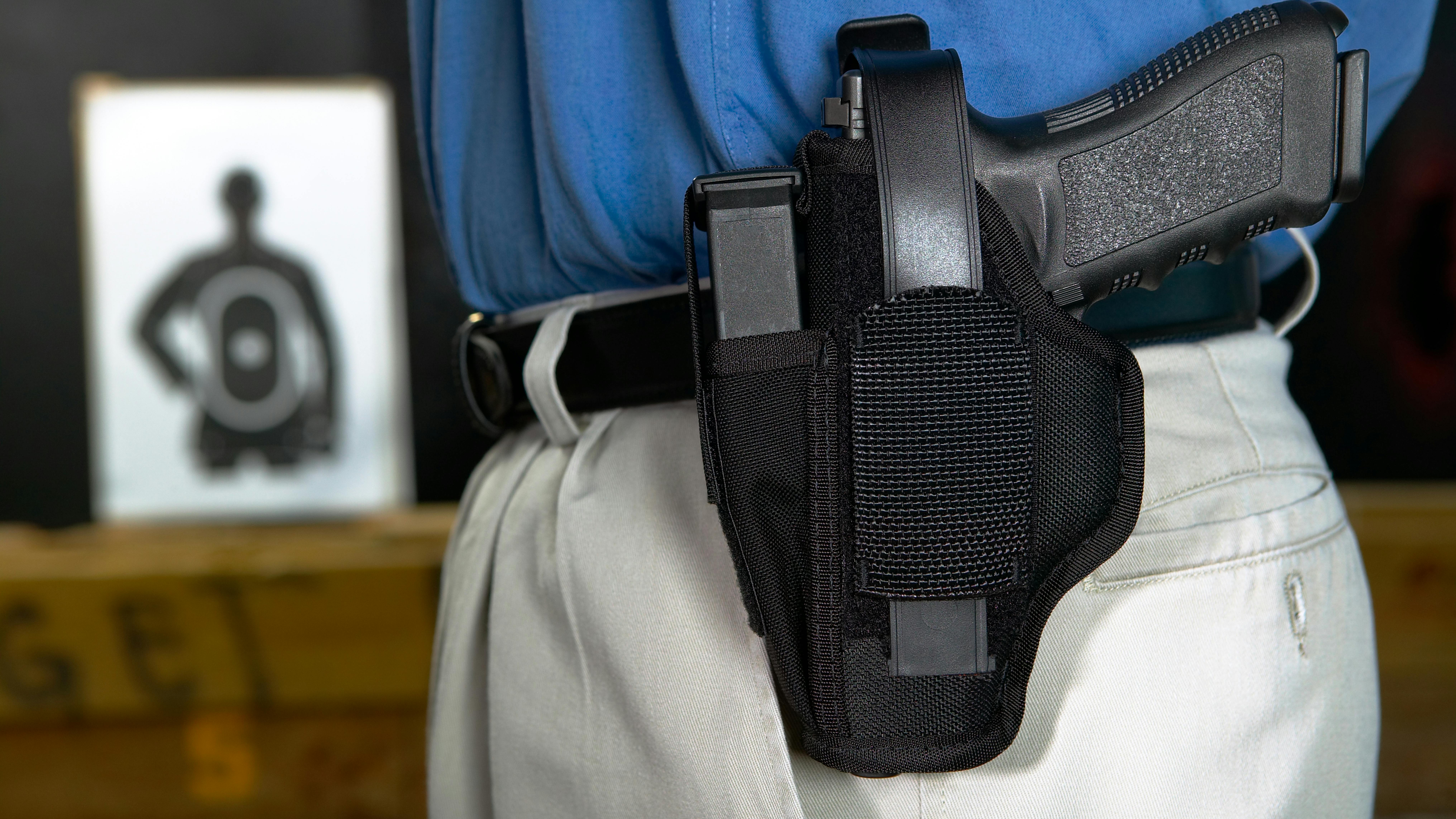 Allowing armed off-duty police officers on Connecticut school grounds.