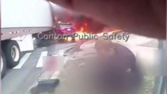 Canton Township, MI, police rescue people after wrong-way collision.