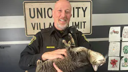 Union City, MI, Police Chief Chris Mathis and Officer Ezra. Union City, MI, Police Chief Chris Mathis and Officer Ezra.