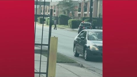 Daytime shootout between Houston police officer and gunman.