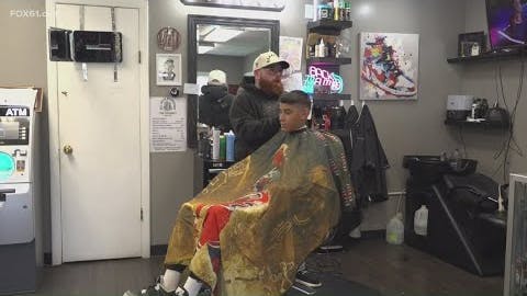 Barber helps brothers in Middletown Police Activity League