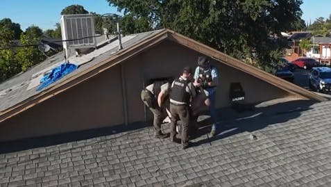 Stanislaus County deputies pull suspect from attic