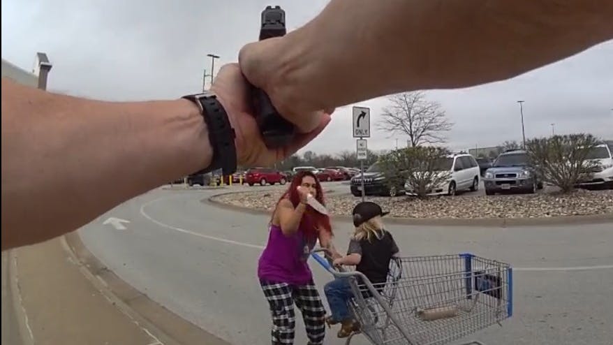 Omaha police confront woman armed with knife.