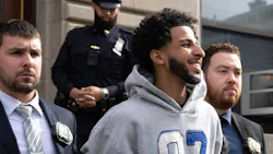 Asil Assaidi is pictured in police custody leaving the NYPD's 104th Precinct stationhouse in Queens on Thursday, April 23, 2026. Asil Assaidi is pictured in police custody leaving the NYPD's 104th Precinct stationhouse in Queens on Thursday, April 23, 2026.