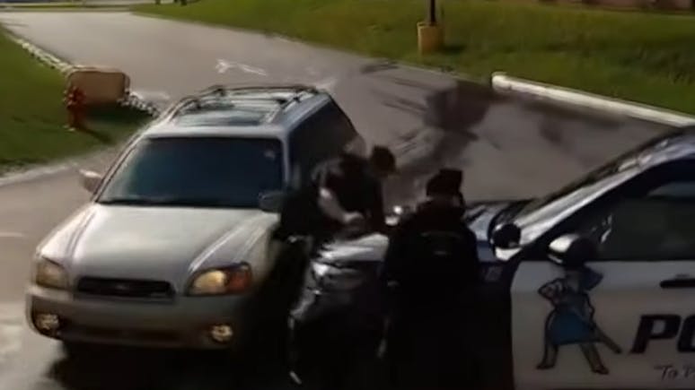 Oak Creek police officer pinned by fleeing suspect