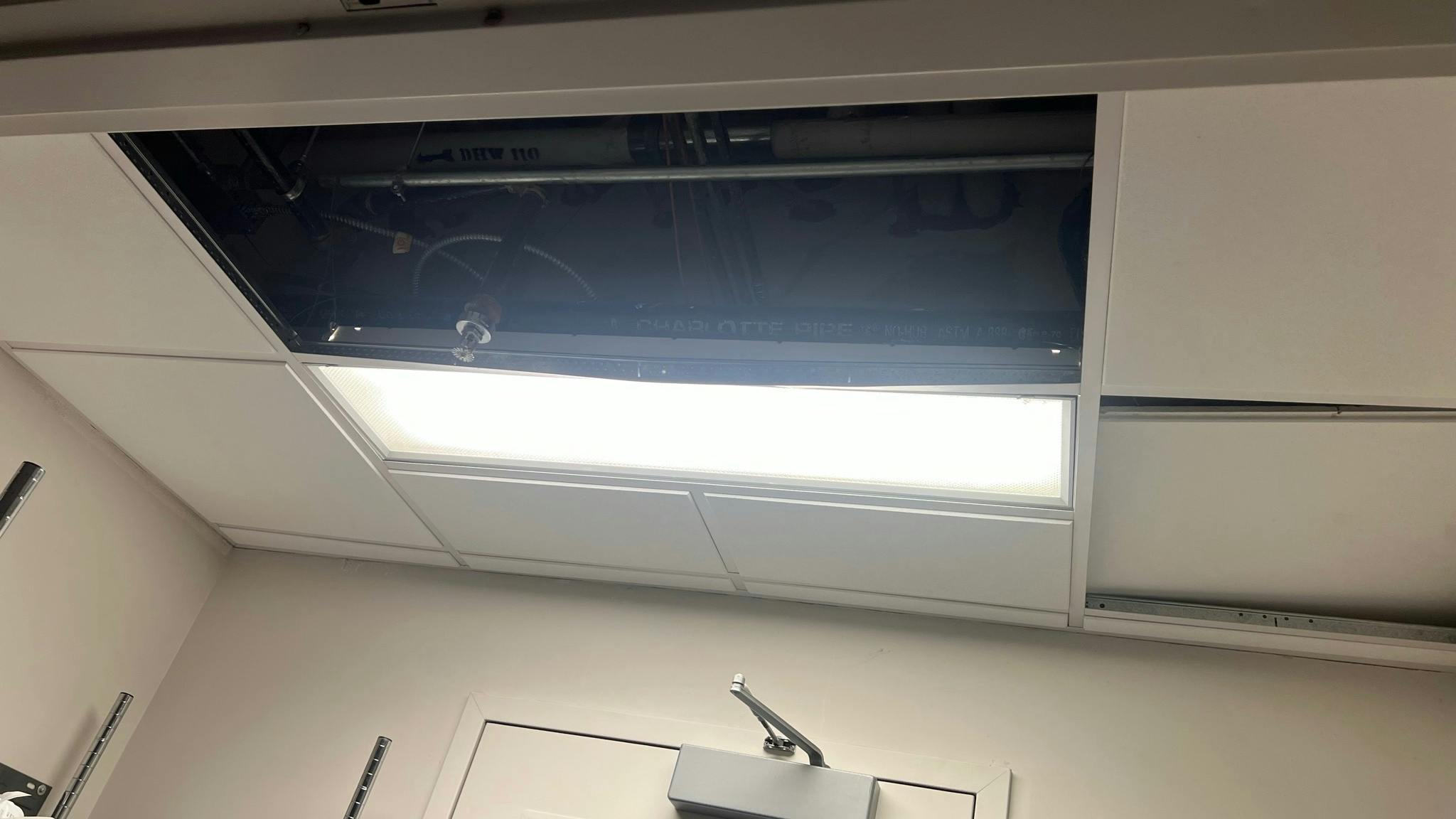 Suspect hides in hospital drop ceiling