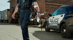 68791dc1fbd730f4e266cfb2police_officer_holding_res 68791dc1fbd730f4e266cfb2police_officer_holding_res