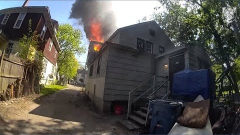 Kalamazoo police officer catches infant dropped from 2nd-floor burning home