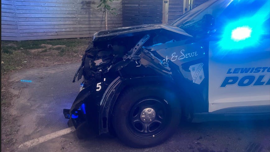 Dump truck rams Lewiston police cruiser
