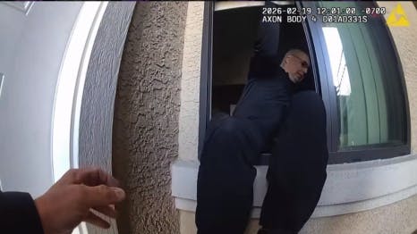 Avondale police officer squeezes through window to help woman