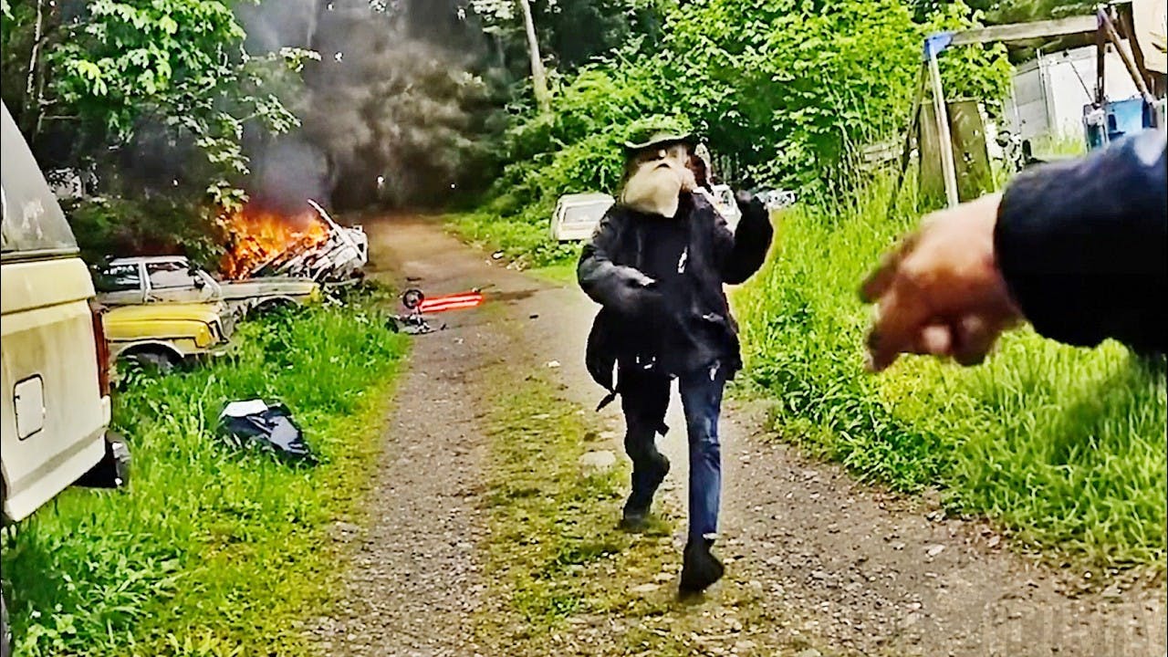 Armed man charges Thurston County deputy