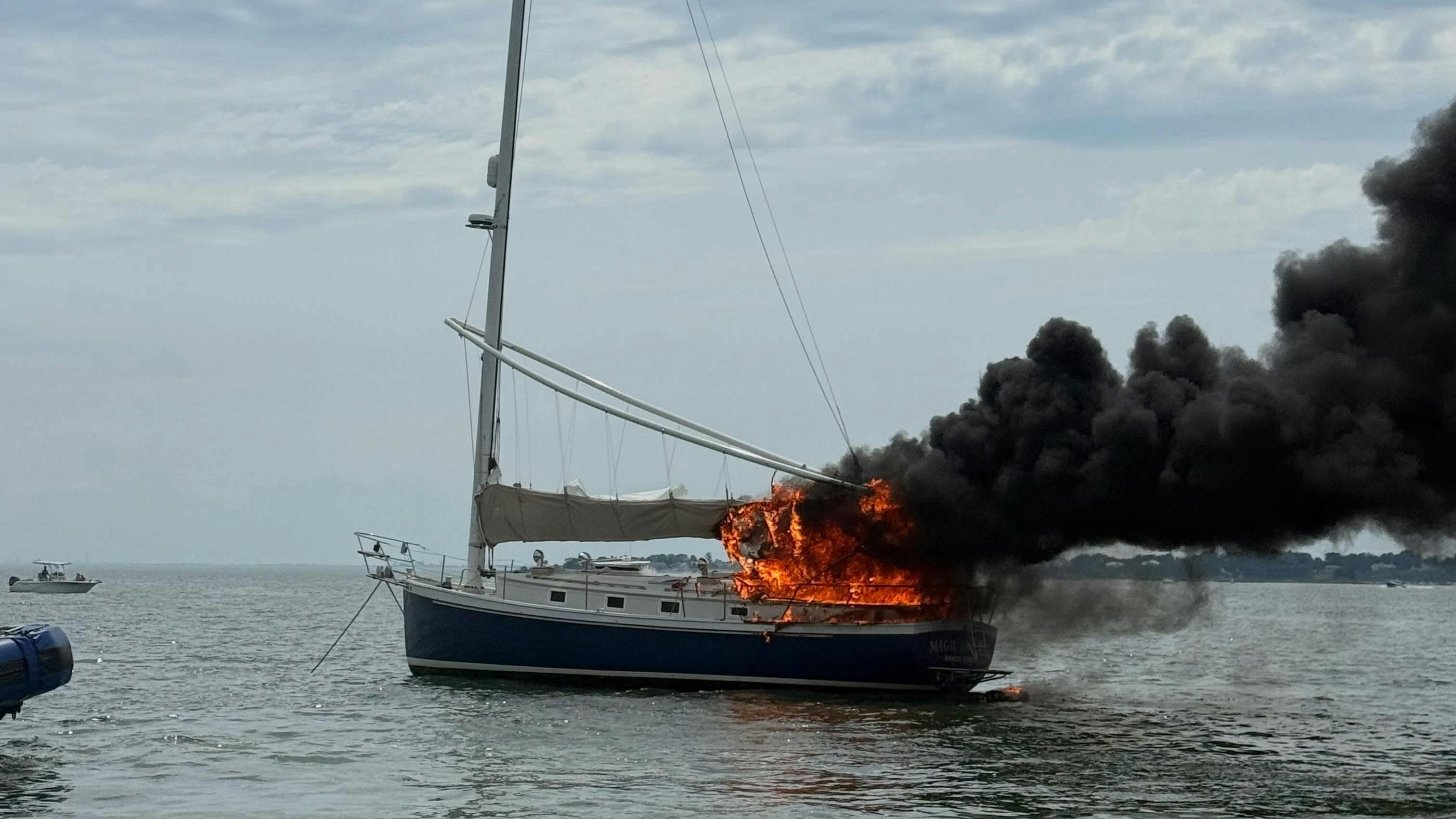 Norwalk police rescue person from burning sailboat
