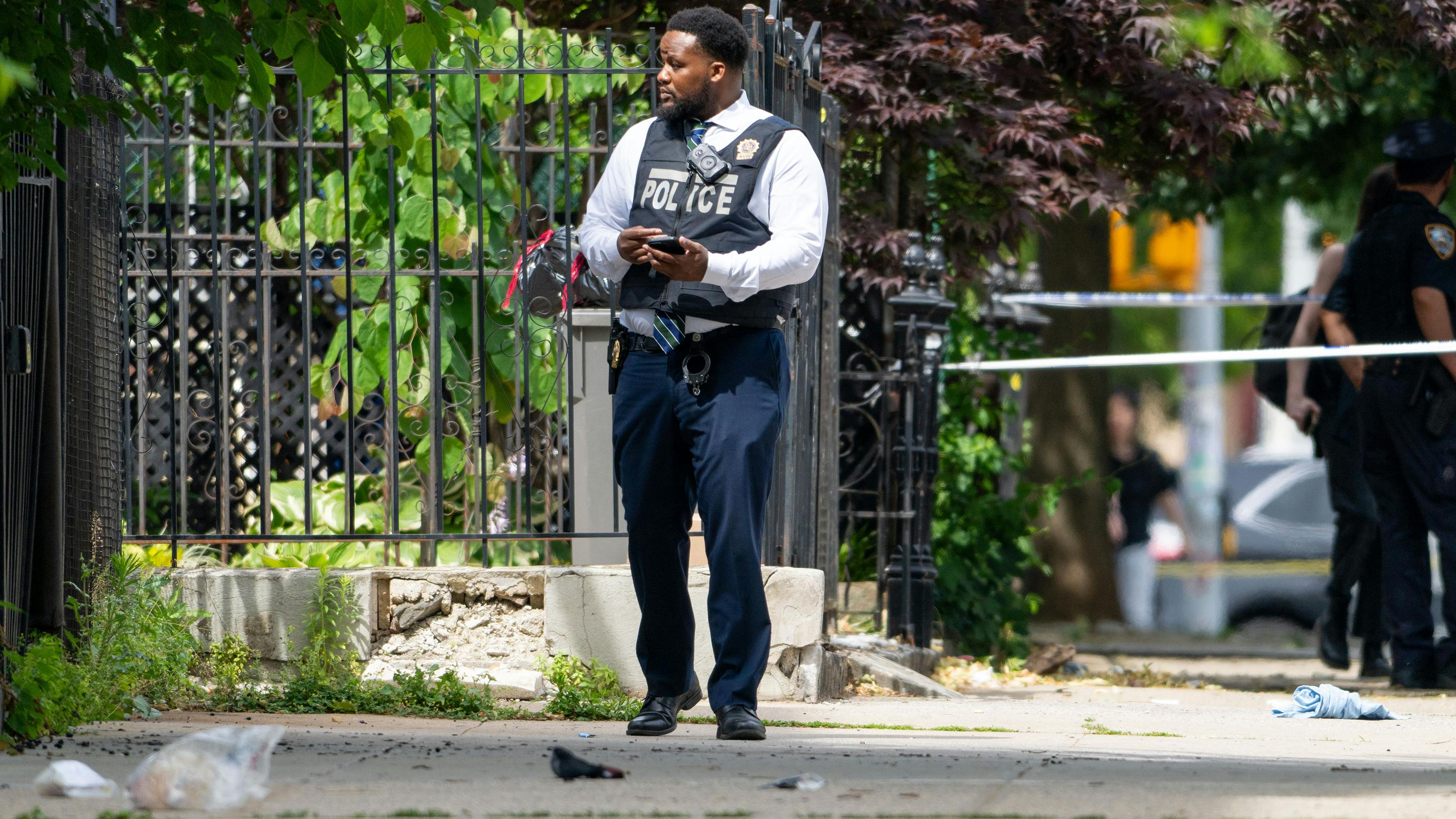 Police investigate after an NYPD cop was shot in the leg inside an apartment building following a heated standoff with a gunman who was killed in an exchange of gunfire on Kosciuszko St. near Marcy Ave. in Bedford- Stuyvesant, Brooklyn, on Friday, June 19, 2026.