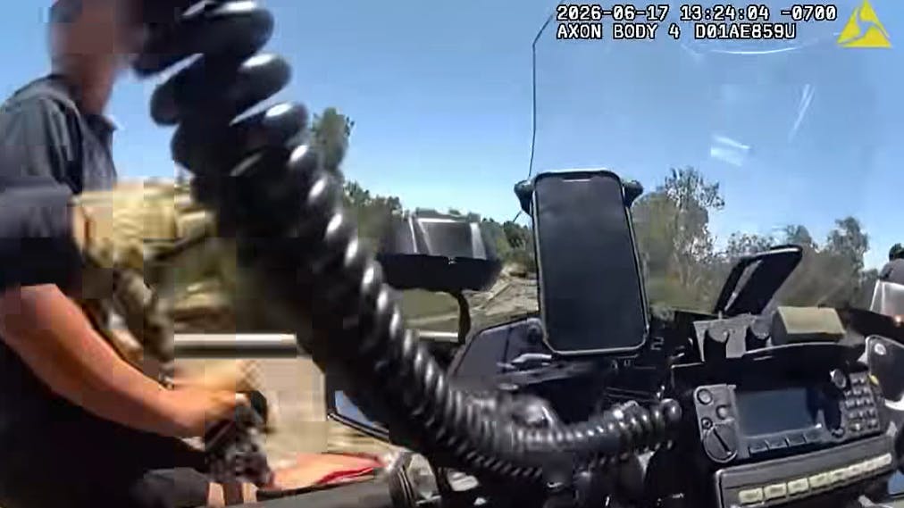 The officer repeatedly issued commands for the rider to stop, including, &ldquo;Get off the bike, or we&rsquo;re gonna have big problems,&rdquo; as the rider allegedly attempted to continue riding.
