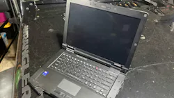 The TOUGHBOOK 56 test unit often found itself on the dirty hood of a Jeep... shown in the garage but tested on dirt roads.