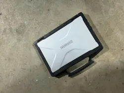 TOUGHBOOK shown on the concrete floor... where it was drop tested a dozen times at least.