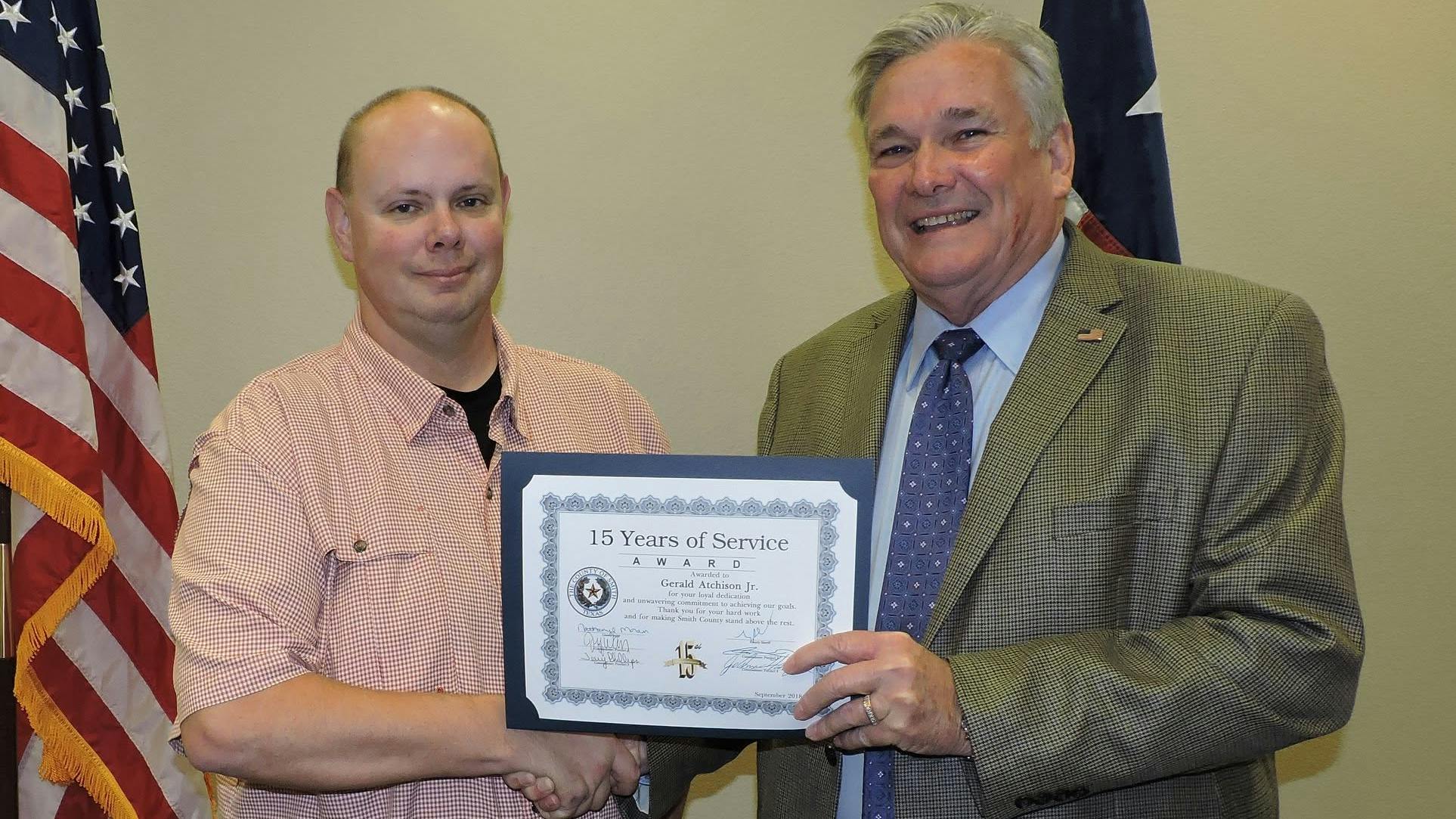 Smith County Sheriff's Deputy Gerald Atchison Jr. and Sheriff Larry Smith in 2018.