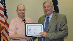 Smith County Sheriff's Deputy Gerald Atchison Jr. and Sheriff Larry Smith in 2018.