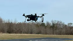 A SIRAS drone hovers in the air