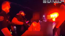 Grand Rapids police carry shooting victim to ambulance
