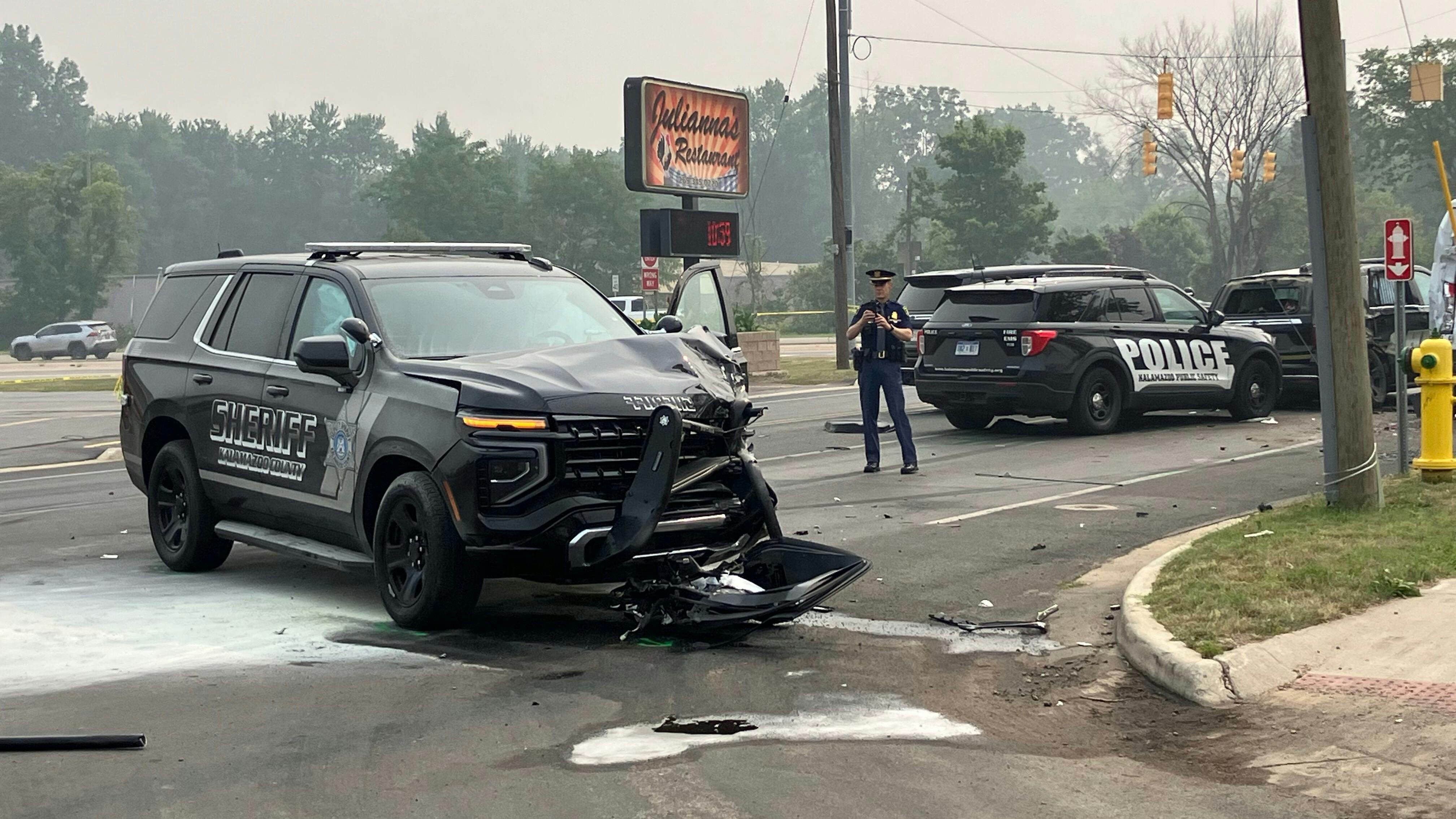 A suspect shot a Kalamazoo County deputy and stole his cruiser