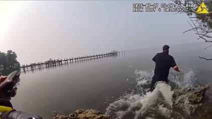 St. Mary's County Deputy Matthew Camp swims out to save autistic boy