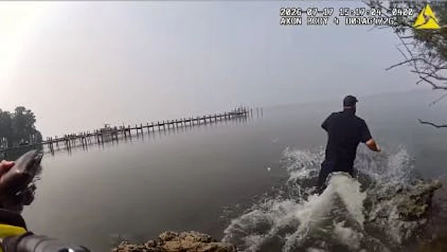 St. Mary's County Deputy Matthew Camp swims out to save autistic boy