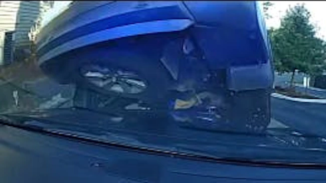 Fleeing suspect's SUV lands on Sandy Springs police cruiser