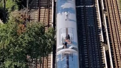 NYPD drone keeps up with New York City subway surfers