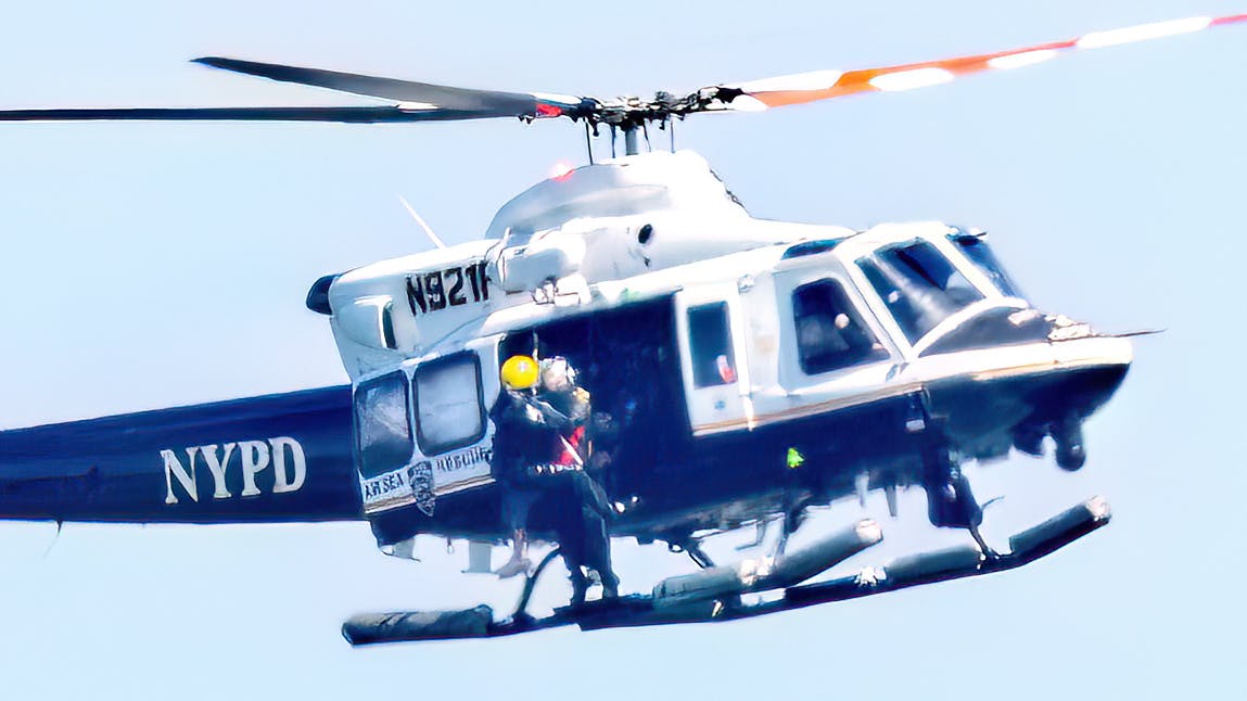 NYPD airlfits a 64-year-old woman out of thick brush in Brooklyn