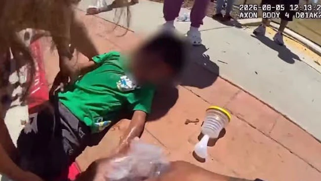 A Rialto police officer uses a LifeVac to revive choking 3-year-old child