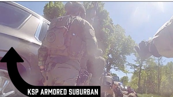 Kentucky troopers use armored SUV to rescue deputies pinned down by gunfire during a standoff