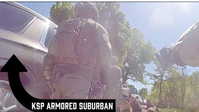 Kentucky troopers use armored SUV to rescue deputies pinned down by gunfire during a standoff