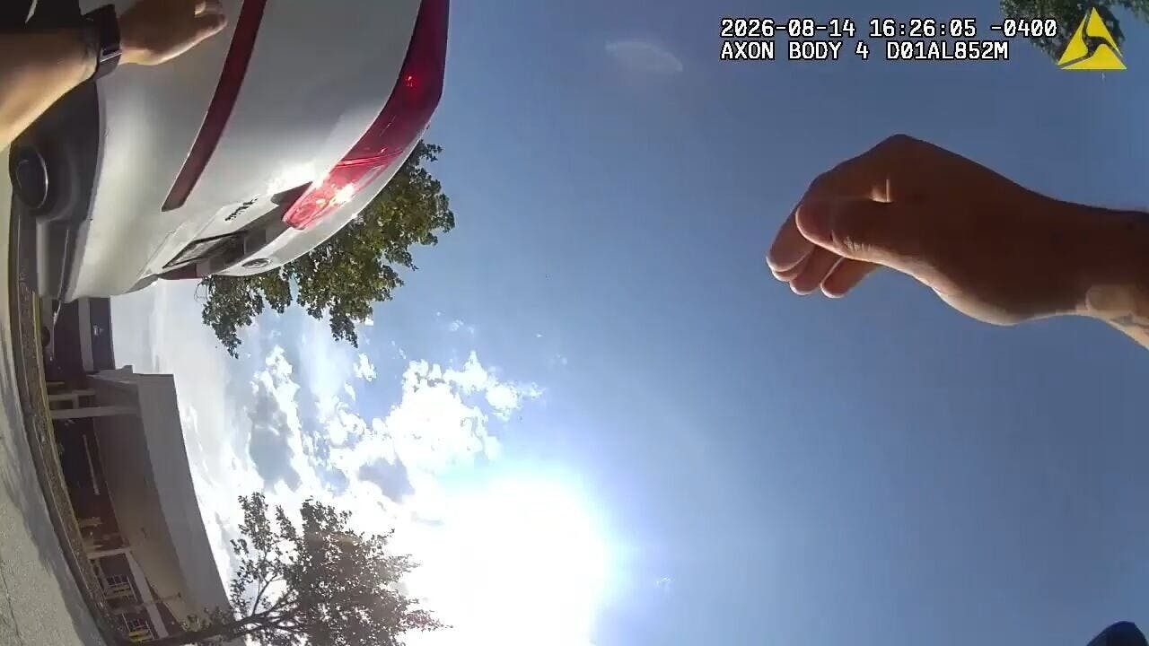 A Covington police officer is dragged by a shoplifting suspect fleeing a traffic stop