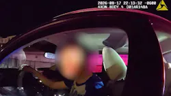 Paker police uses her body camera's translator to speak with a Mandarin-speaking driver during a traffic stop