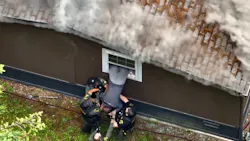 Snohomish County deputies save armed man from burning house
