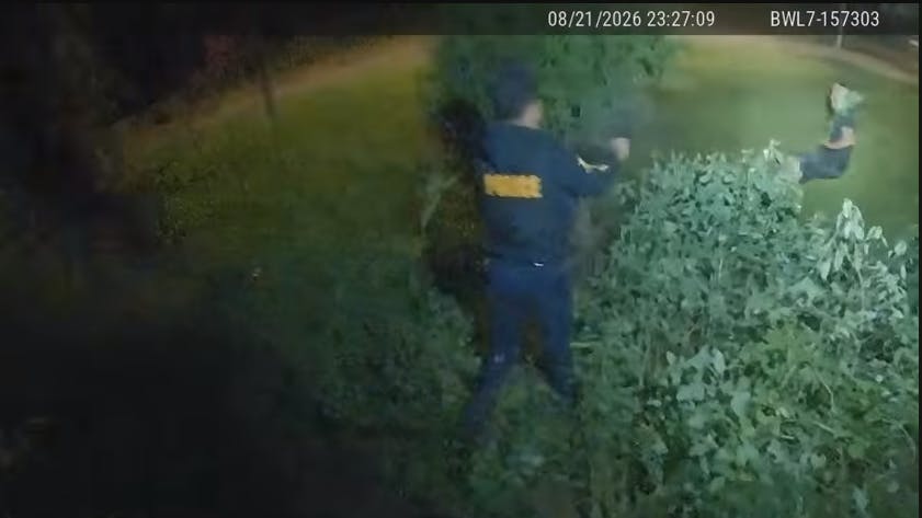 Body camera footage shows Connecticut police confronting an armed suspect