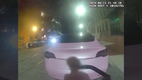 Tesla driver accused of hitting Baltimore police officer on bicycle
