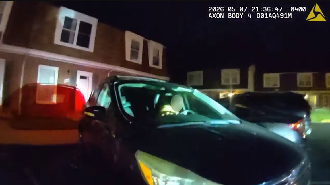A suspect accused of carjacking a vehicle accelerates toward Anne Arundel County police